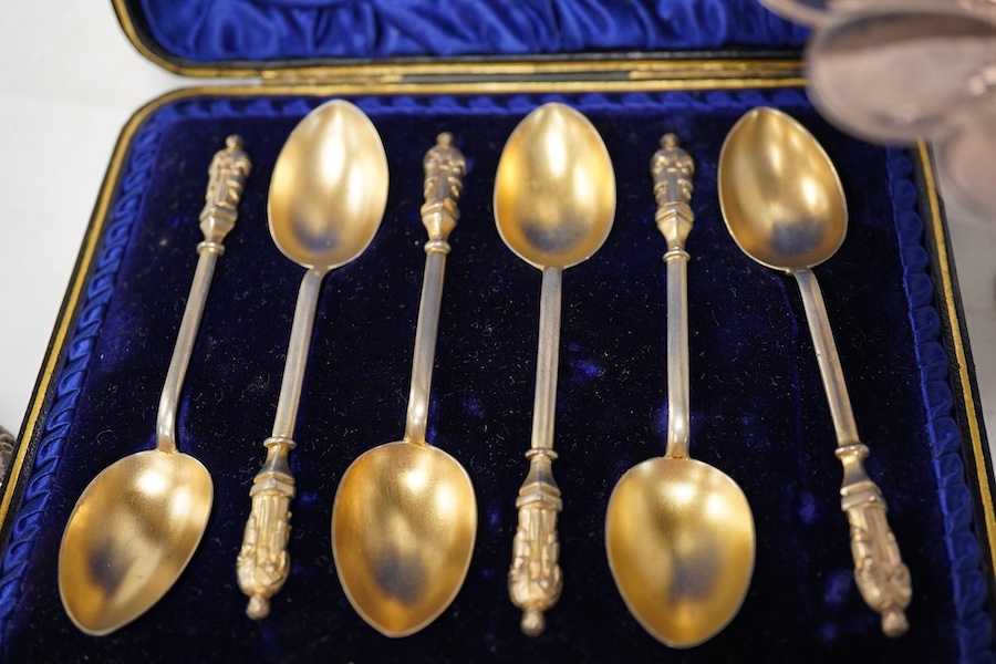 A modern silver shell dish on dolphin support, by Mappin & Webb, Sheffield, 1987, height 11cm, together with a cased set of six late Victorian parcel gilt silver apostle teaspoons, a 1960's small silver dish with Winston